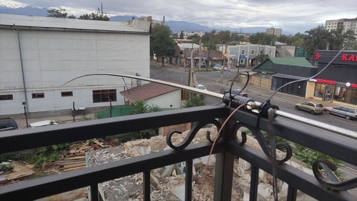 PAC-12 antenna attached to a balcony in Bishkek